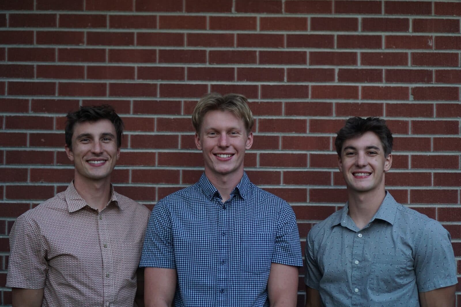 The three Green brothers — Thomas, Daniel, and Andrew — owners and operators of Green Brothers Gutters, a family-run seamless gutter company serving the Colorado Front Range and foothills.